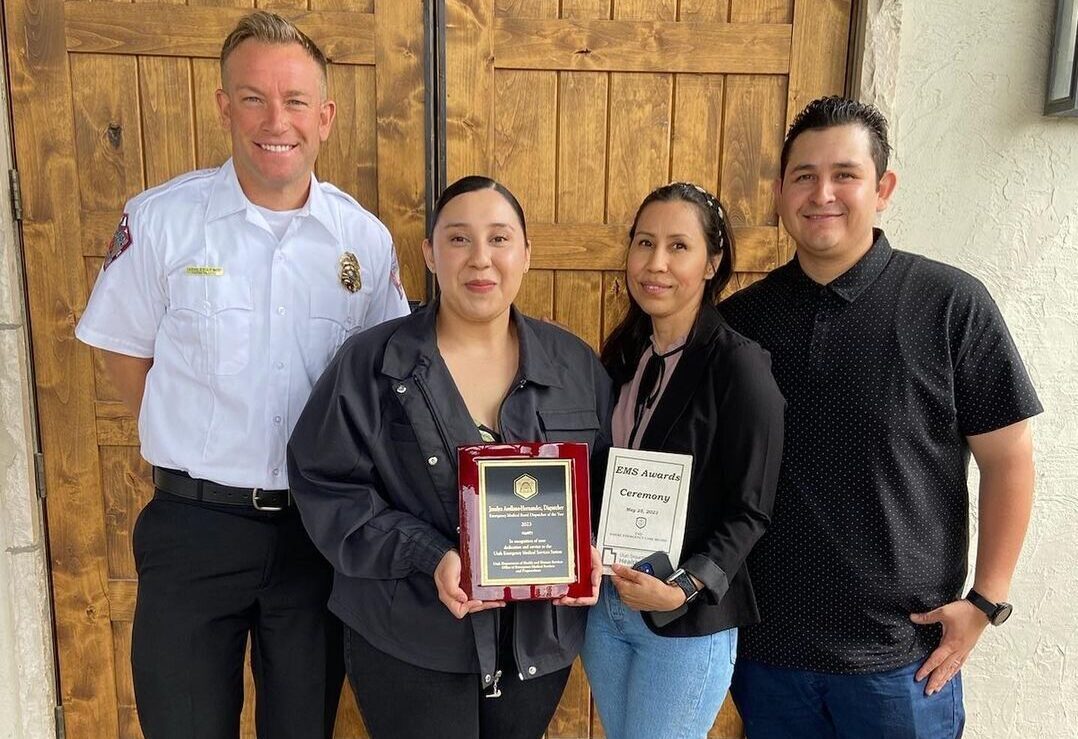 Award-winner Joselyn Arellano-Hernandez with her mom, stepdad, and PCFD Battalion Chief Ashley Lewis.