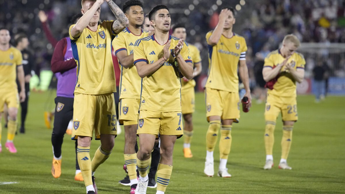 Real Salt Lake midfielder Pablo Ruiz, front, leads teammates to acknowledge the team's fans after the second half of an MLS soccer match against the Colorado Rapids Saturday, May 20, 2023, in Commerce City, Colo.