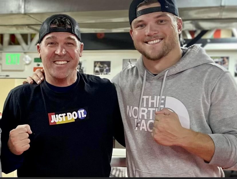 Park City boxer Shane Heaps training NFL player Cole Holcomb.