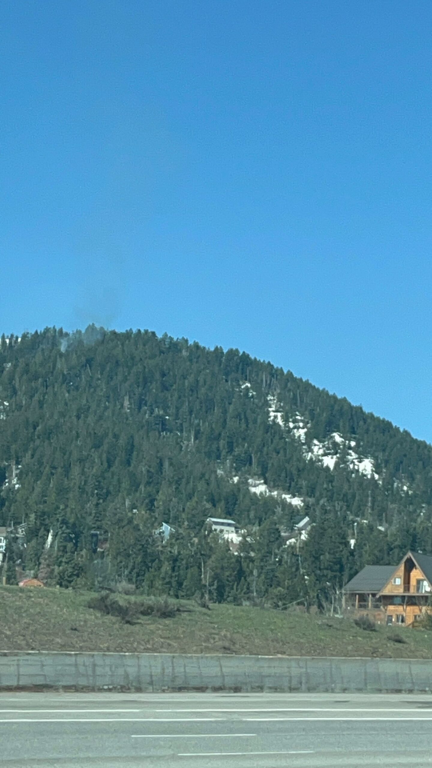 Smoke coming from the prescribed burn at Summit Park is visible from I-80.