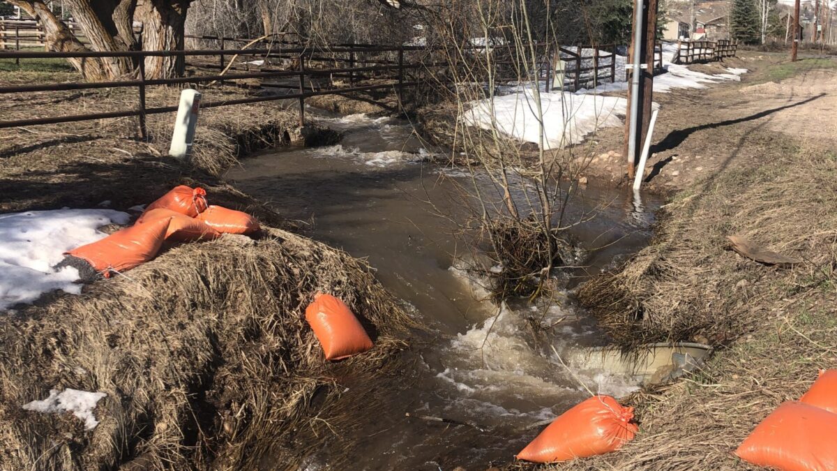 Sandbags used to block a drainage on Old Ranch Road that caused back yard flooding