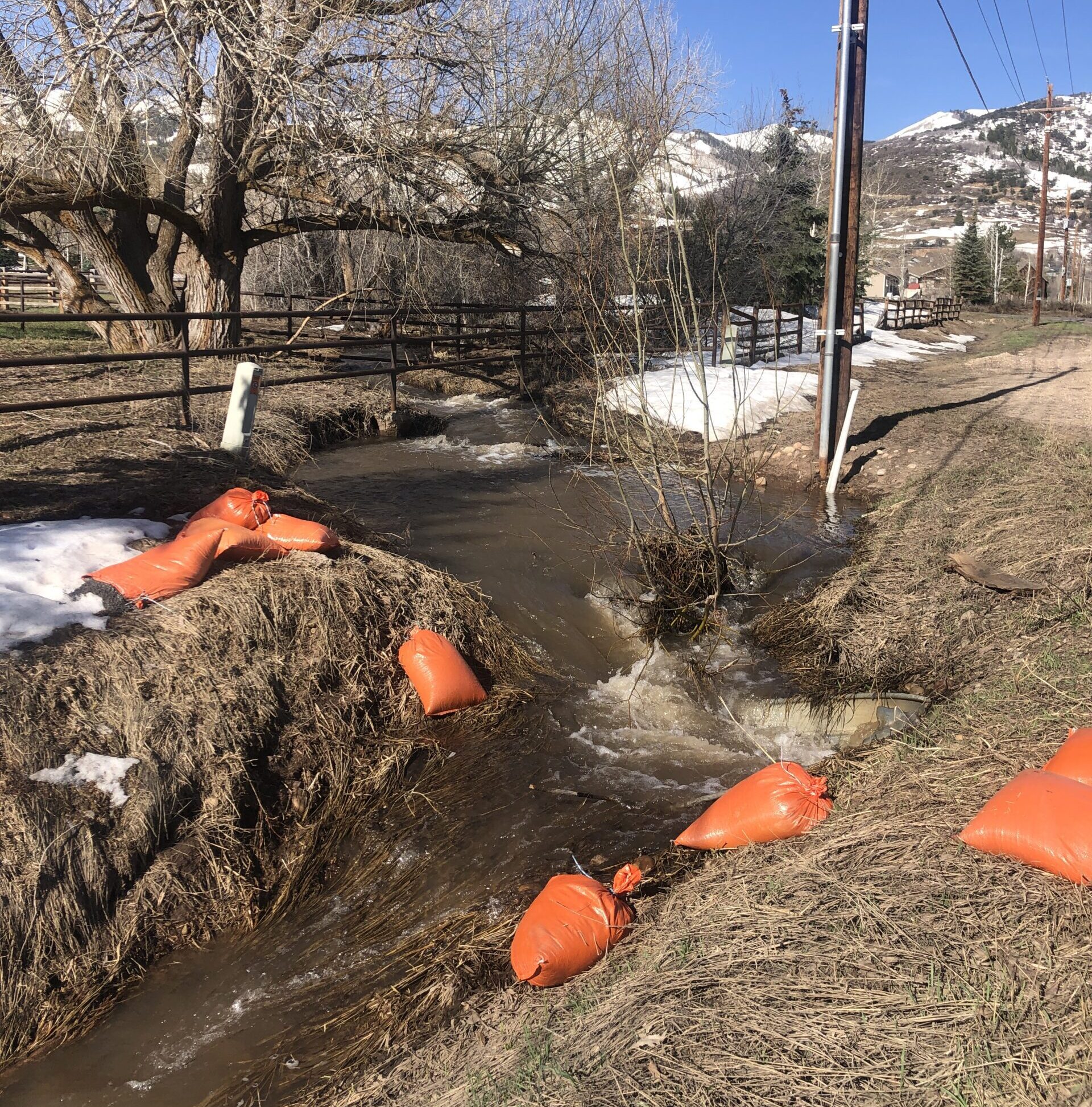 Sandbags used to block a drainage on Old Ranch Road that caused back yard flooding