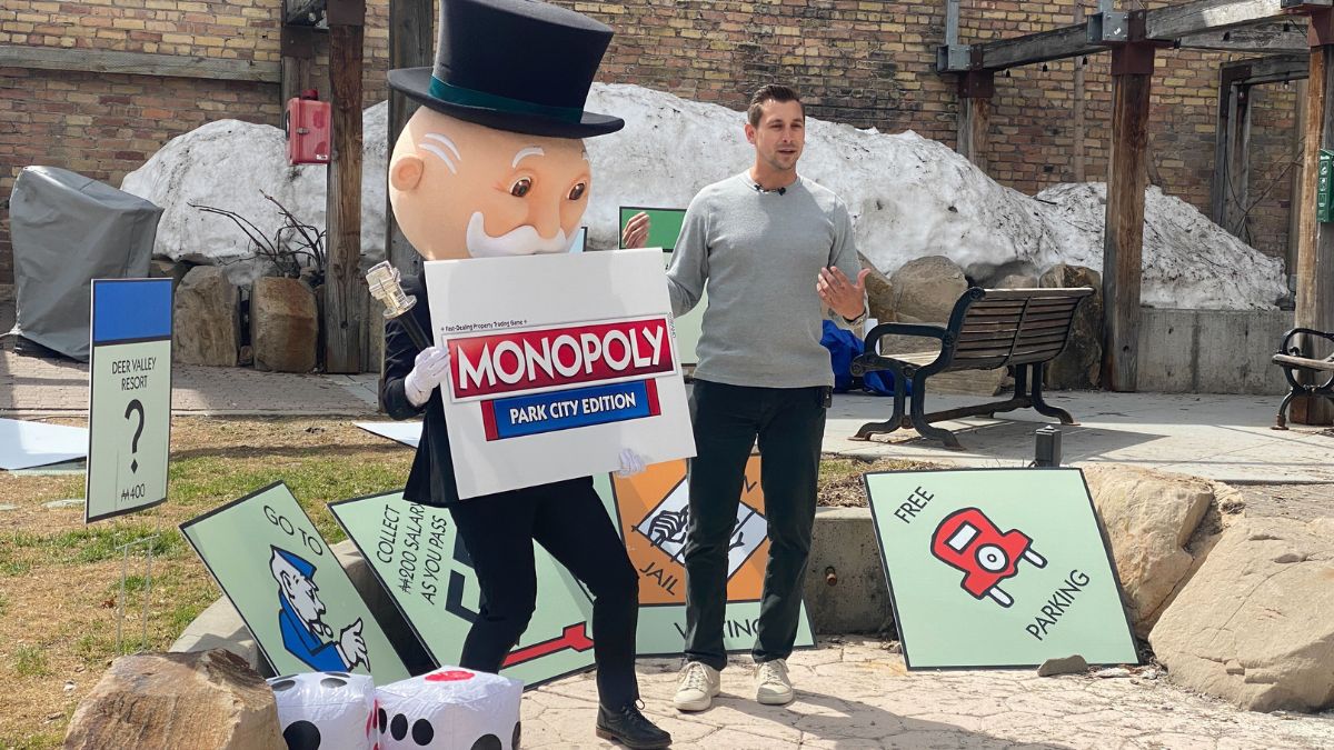 The Monopoly Man and Aaron Green, a representative from Top Trumps USA, announce MONOPOLY: Park City Edition. May 9, 2023.