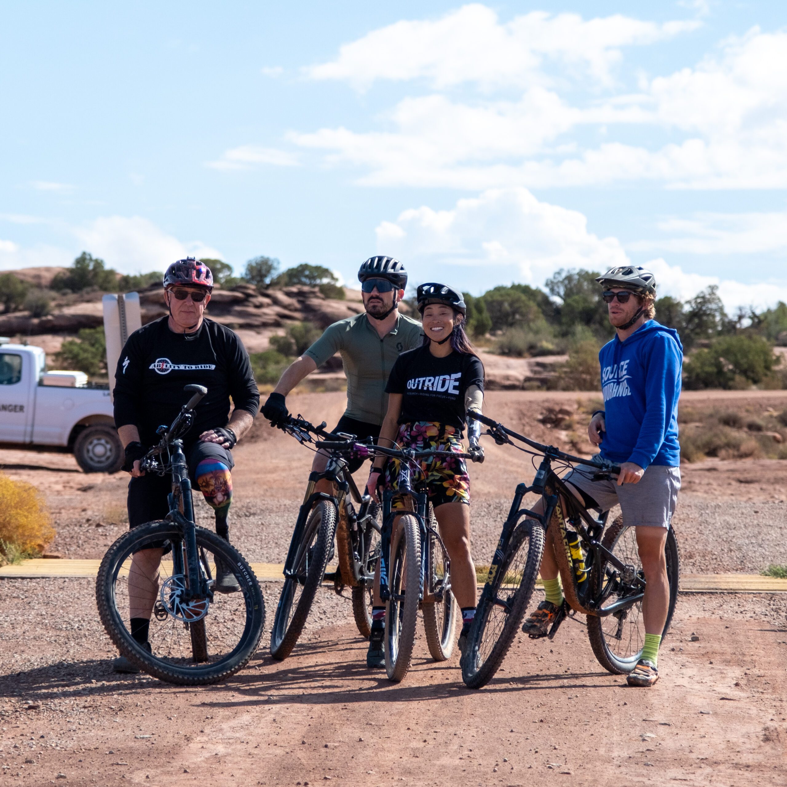 Four adaptive cyclists, Annijke Wade (not-pictured), Josie Fouts, Roger Withers, and Steven Wilke, embarked on a challenge to complete Moab and Canyonlands National Park's 100-mile White Rim Trail in one day.