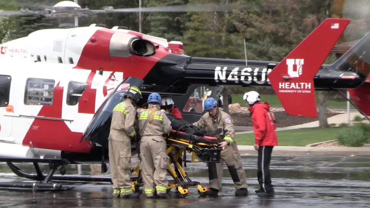 Park City Fire District crew members load a stretcher into a University of Utah AirMed helicopter as part of an exercise at Park City High School earlier this week.