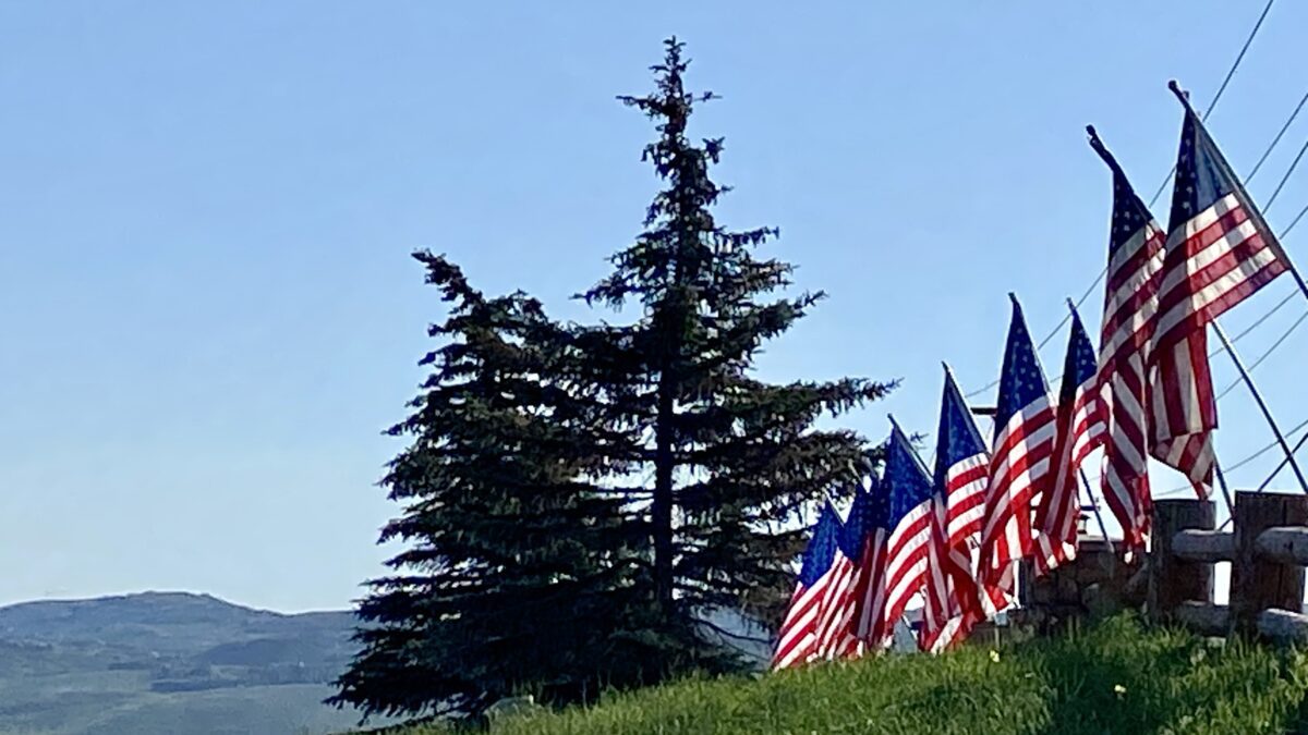 American flags fly for the Fourth of July at the Children's Justice Center of Summit County.