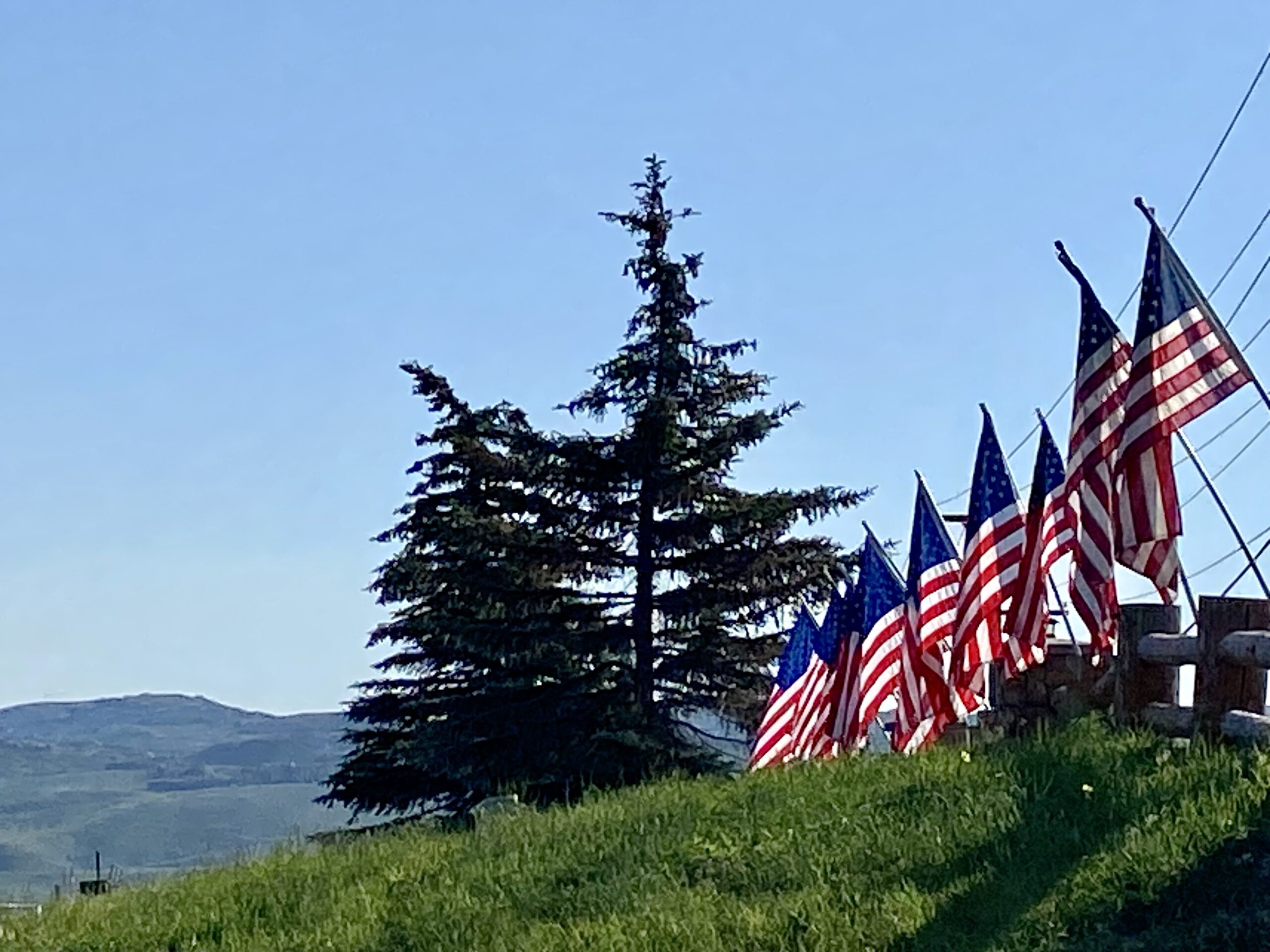 American flags fly for the Fourth of July at the Children's Justice Center of Summit County.