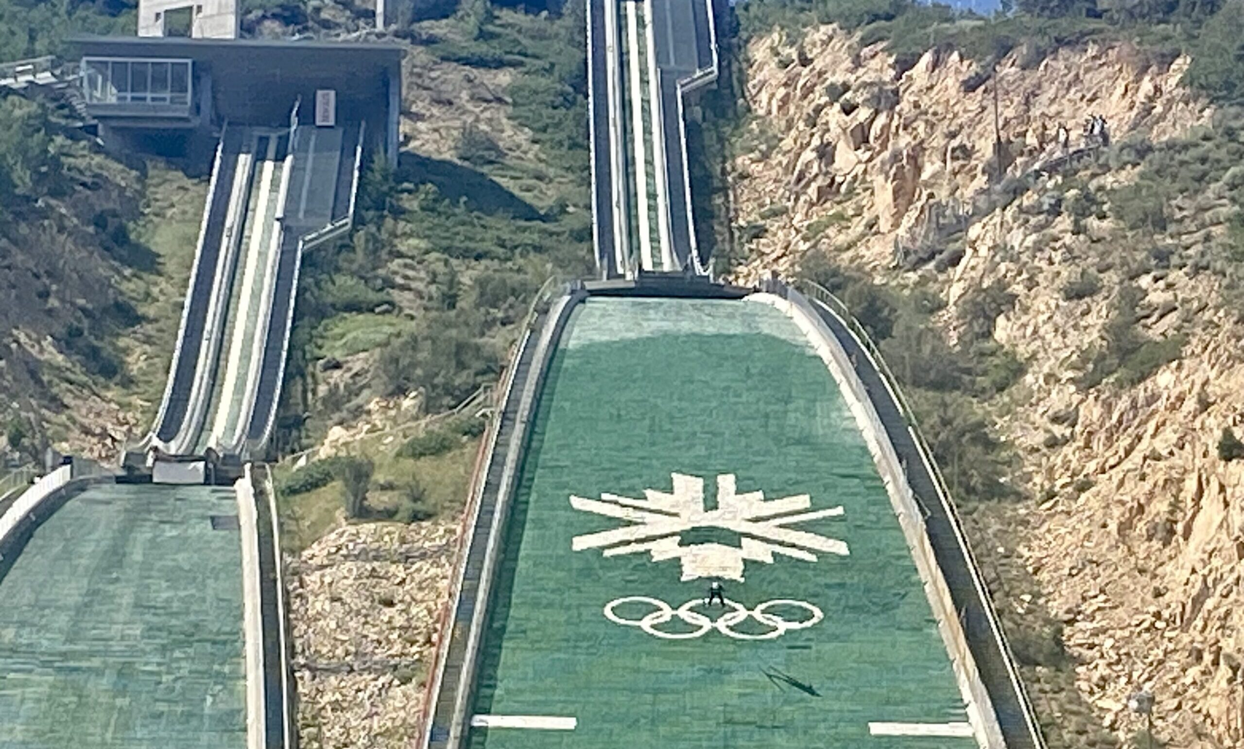 Ski jumper pictured in the center of the Olympic rings during the Springer Tournee at the Utah Olympic Park.