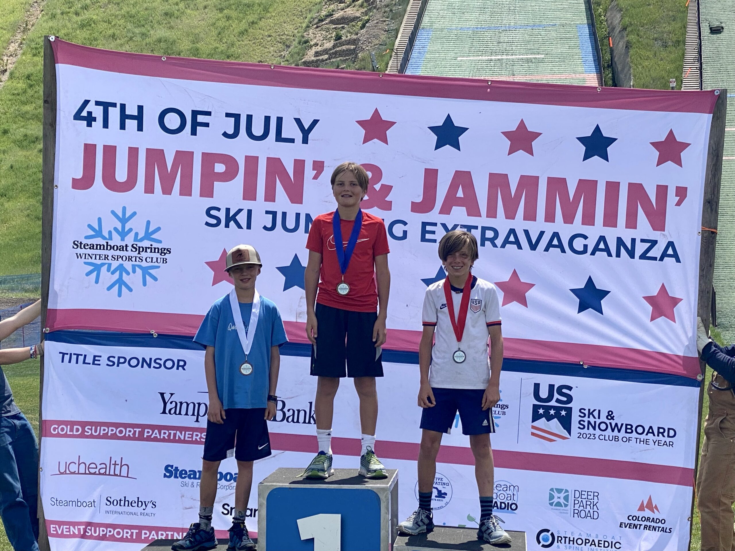 Liam Demong on top of the podium in Steamboat Springs, CO for the nordic combined Park City Ski and Snowboard Team.