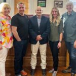 Frank Smith (center) at his swearing in ceremony as the new Summit County sheriff on July 17, 2023. He is pictured with Summit County Council members Tonja Hanson, Canice Hart, Malena Stevens and Roger Armstrong.