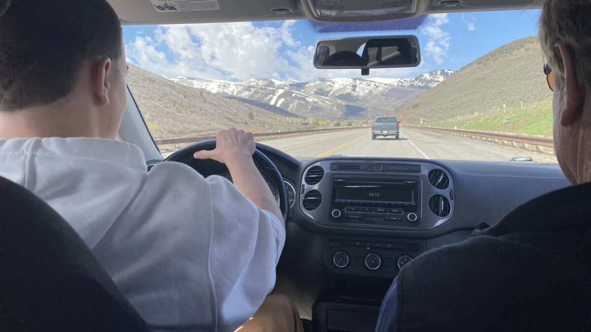 A Park City teen driver utilizes their learner's permit on S.R. 248 driving to school at the Kearns Boulevard campus with a parent passenger.