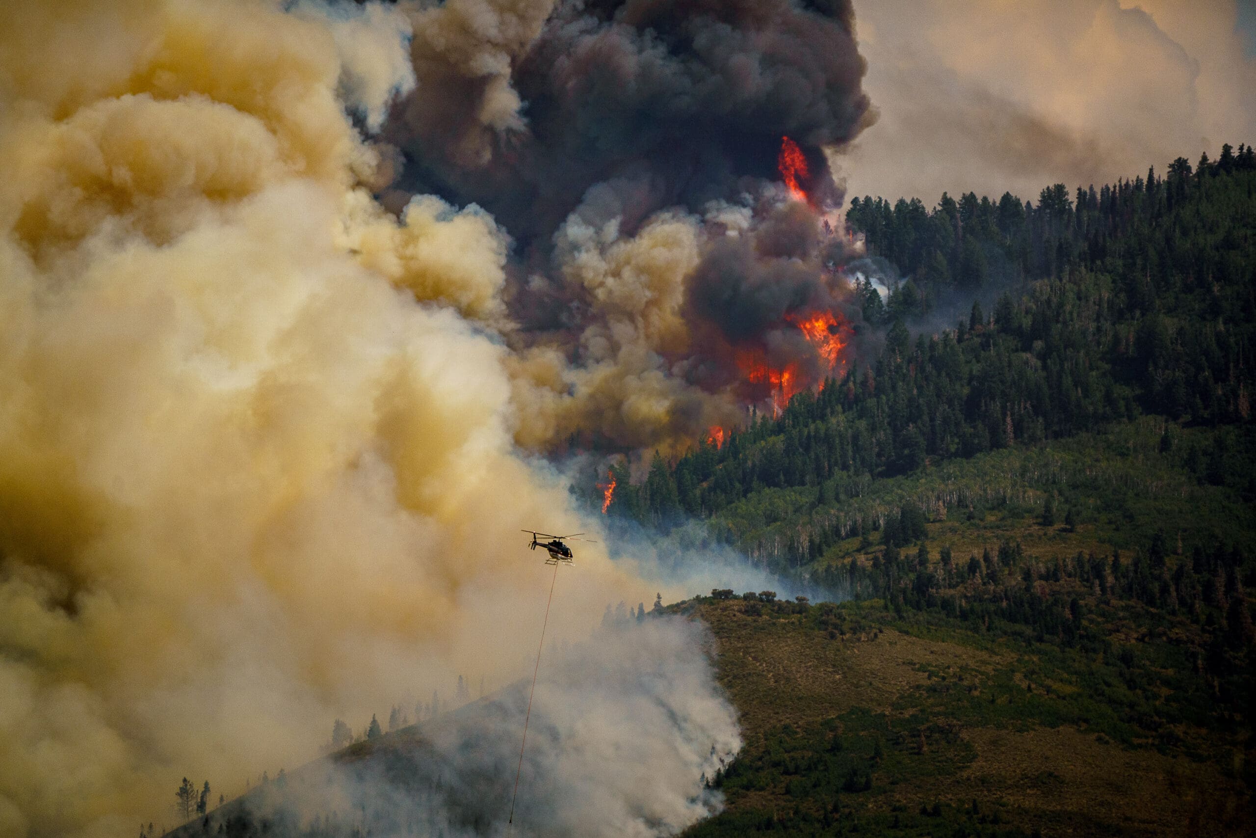 Photo by Trent Nelson/The Salt Lake Tribune The Parleys Canyon Fire burns on Saturday, Aug. 14, 2021.