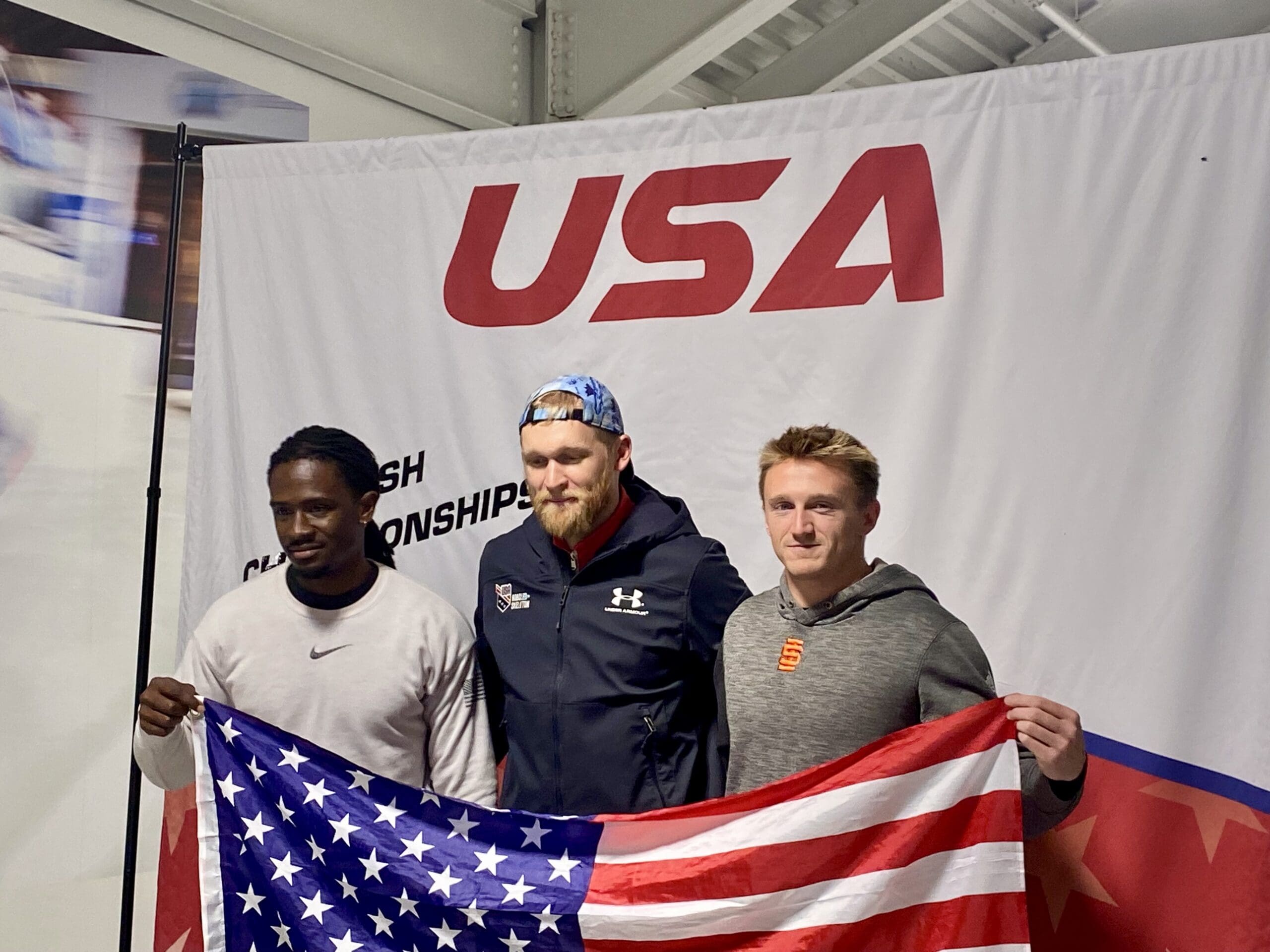 UOP's Andrew Whittier (far right) on the podium in Lake Placid, N.Y. after tying for 2nd place in the Indoor National Push Championships.