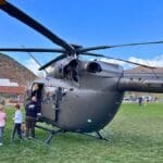 McPolin students get a sneak peek of the Lakota Helicopter cabin.