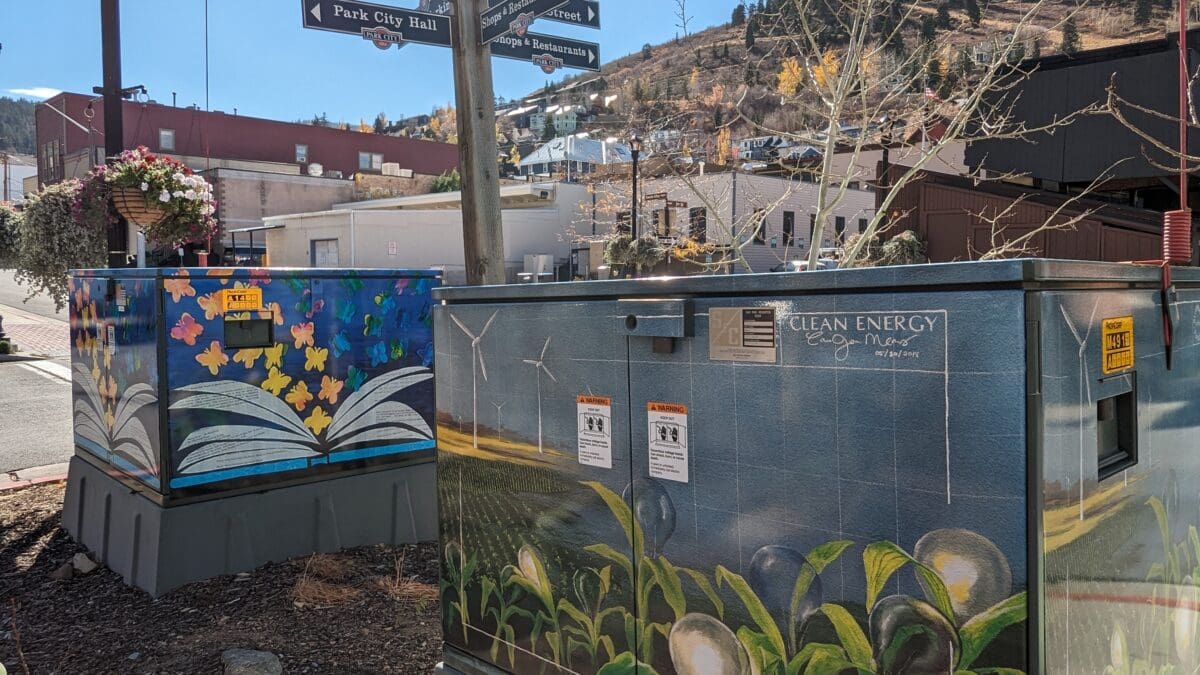 Two of the utility boxes beautified during the 2018 emPOWERment project as seen in October 2023