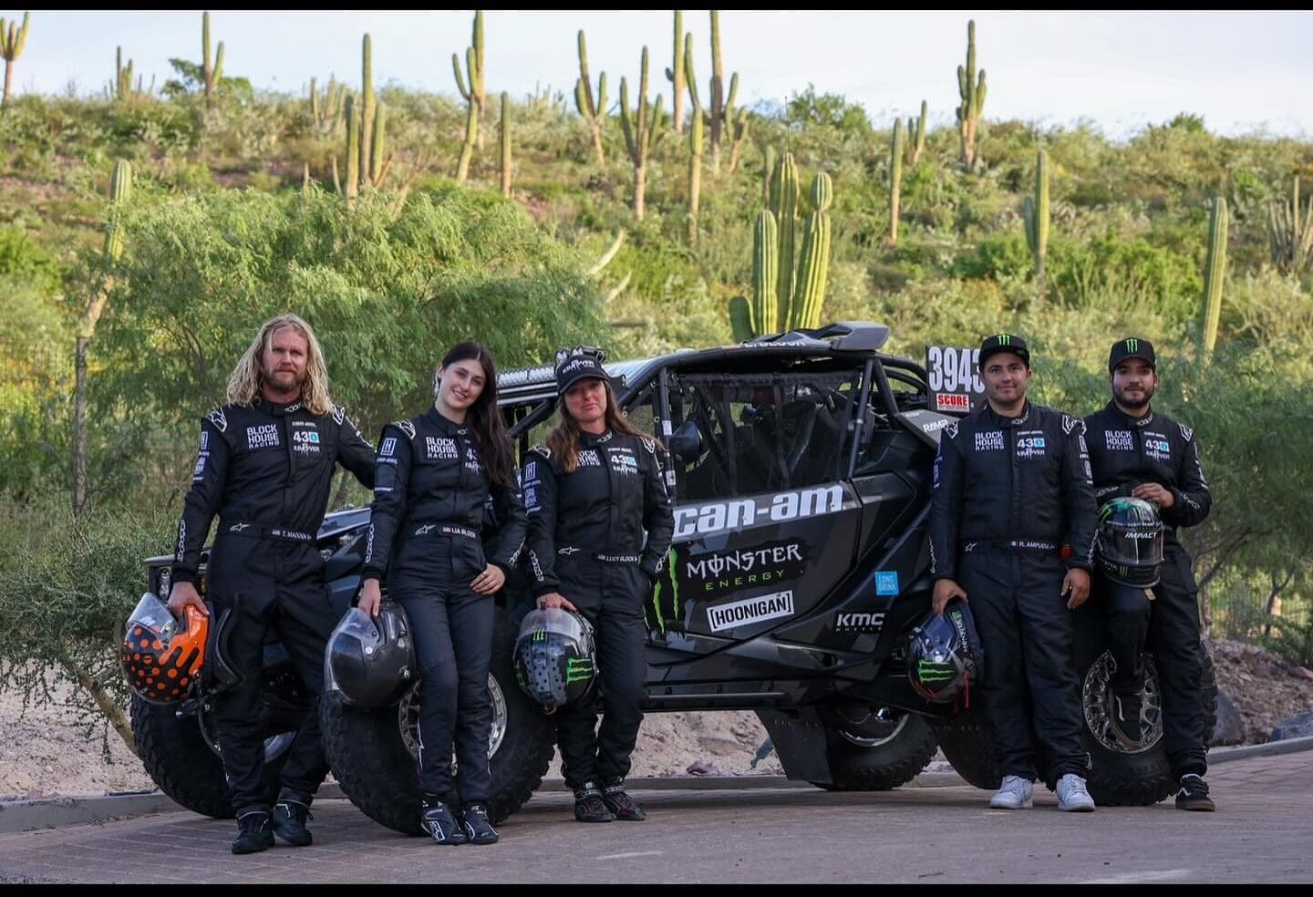 Lia and Lucy Block with their Block House Racing Team before winning their division of the Mexico desert's BAJA 1000.