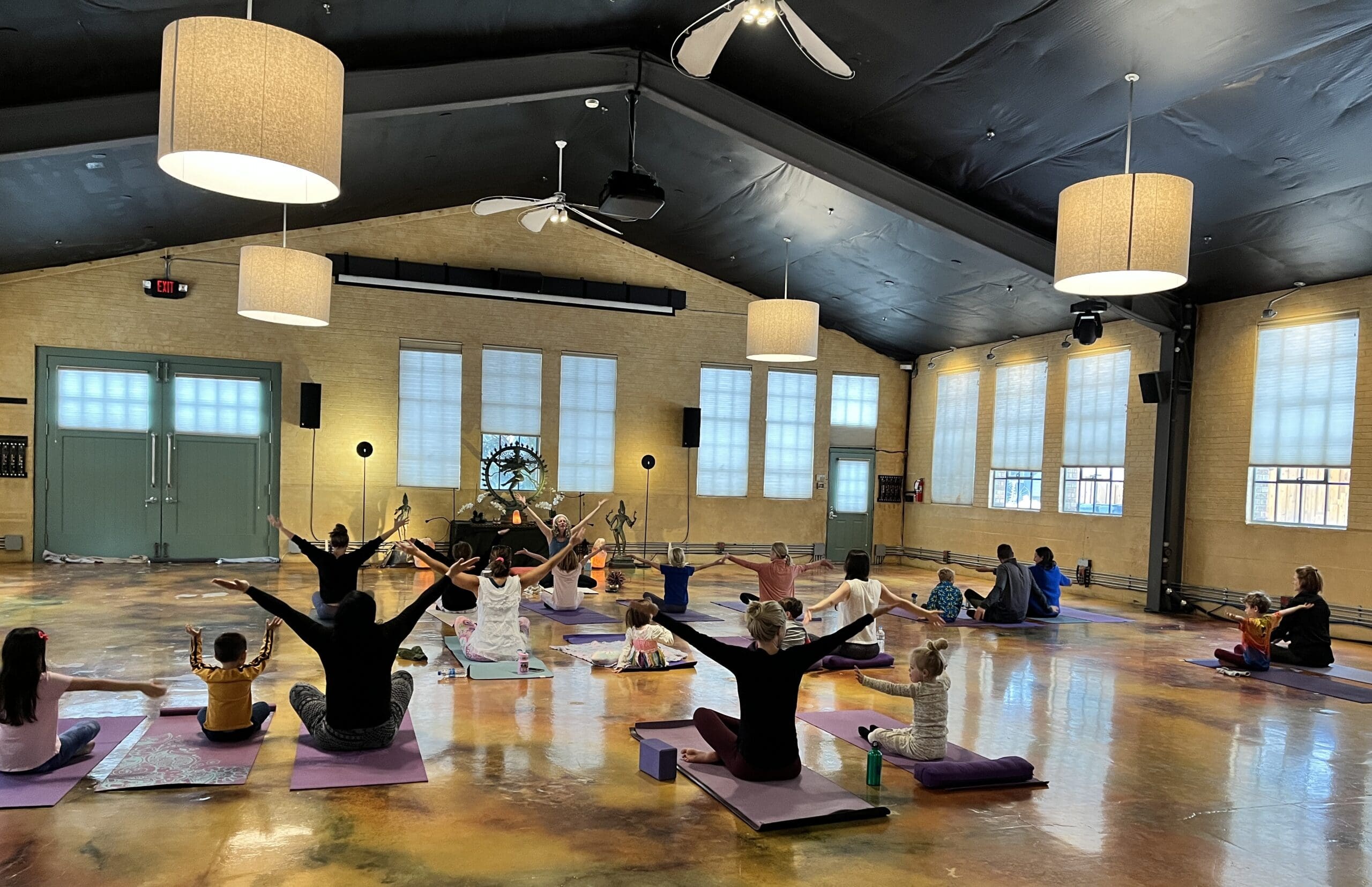 Randi Jo leading yoga in Park City. Her holiday sessions are available this month.