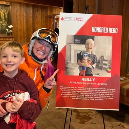 Shred for Red's Honored Hero Reilly poses with Olympian Shannon Bahrke-Happe at the Shred for Red event at Deer Valley on Dec. 2, 2023.
