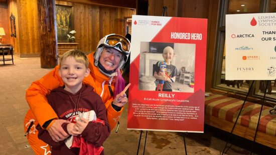 Shred for Red's Honored Hero Reilly poses with Olympian Shannon Bahrke-Happe at the Shred for Red event at Deer Valley on Dec. 2, 2023.