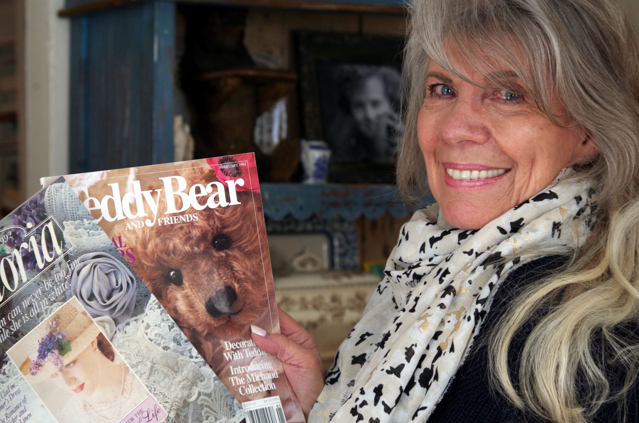 Anita Crane showing her international magazine covers.