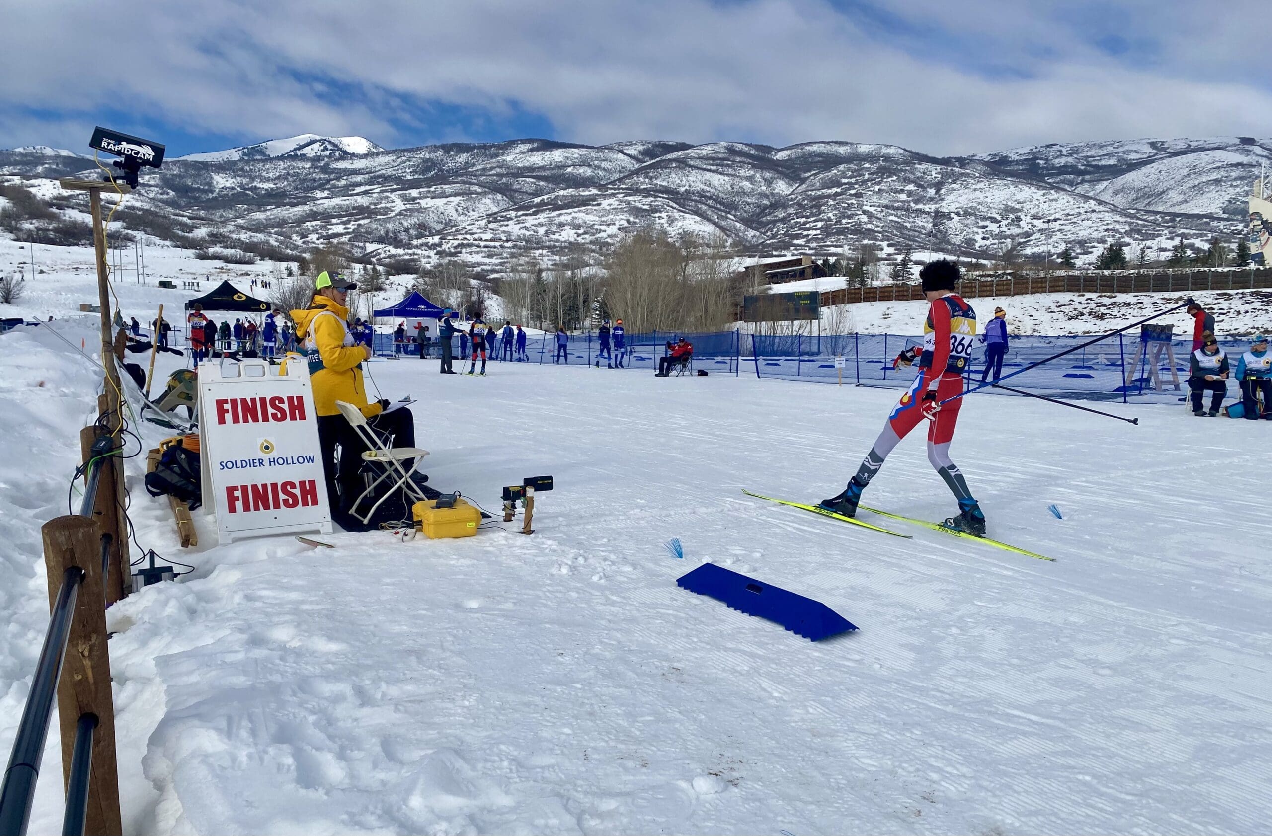 One of the older skiers from out of town crosses the finish line at Soldier Hollow's Super Q XC race this weekend.