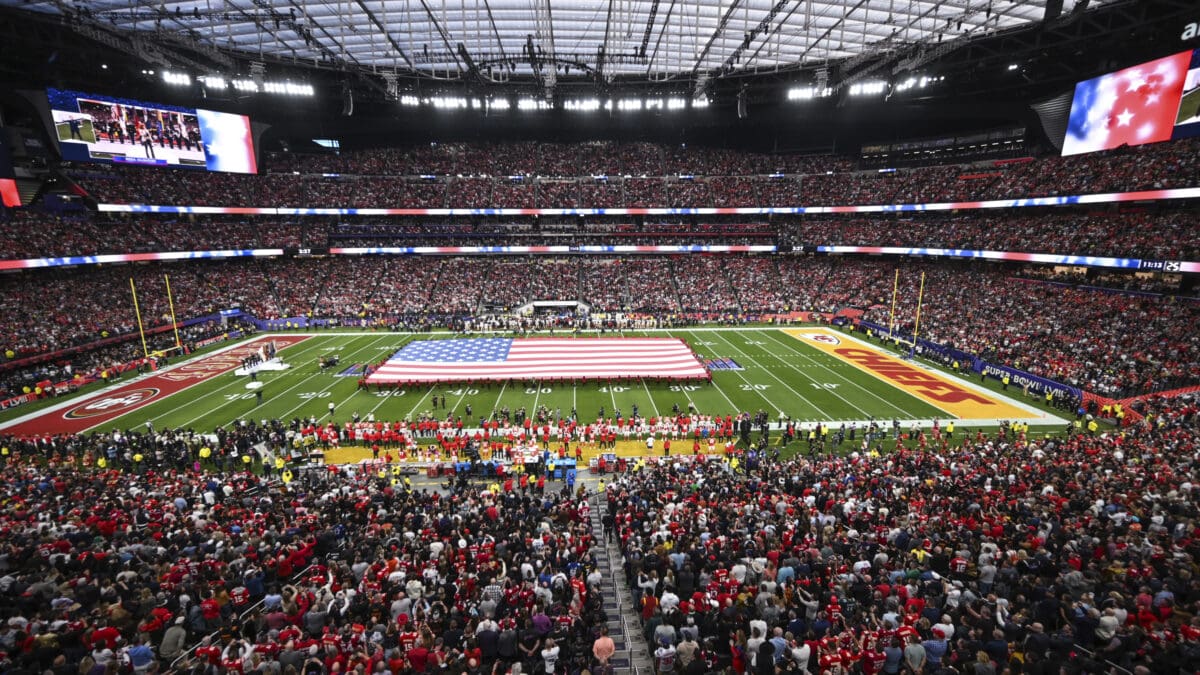 The large American flag on the field during the pre-game ceremony at Super Bowl LVIII was made by Colonial Flag in Sandy.