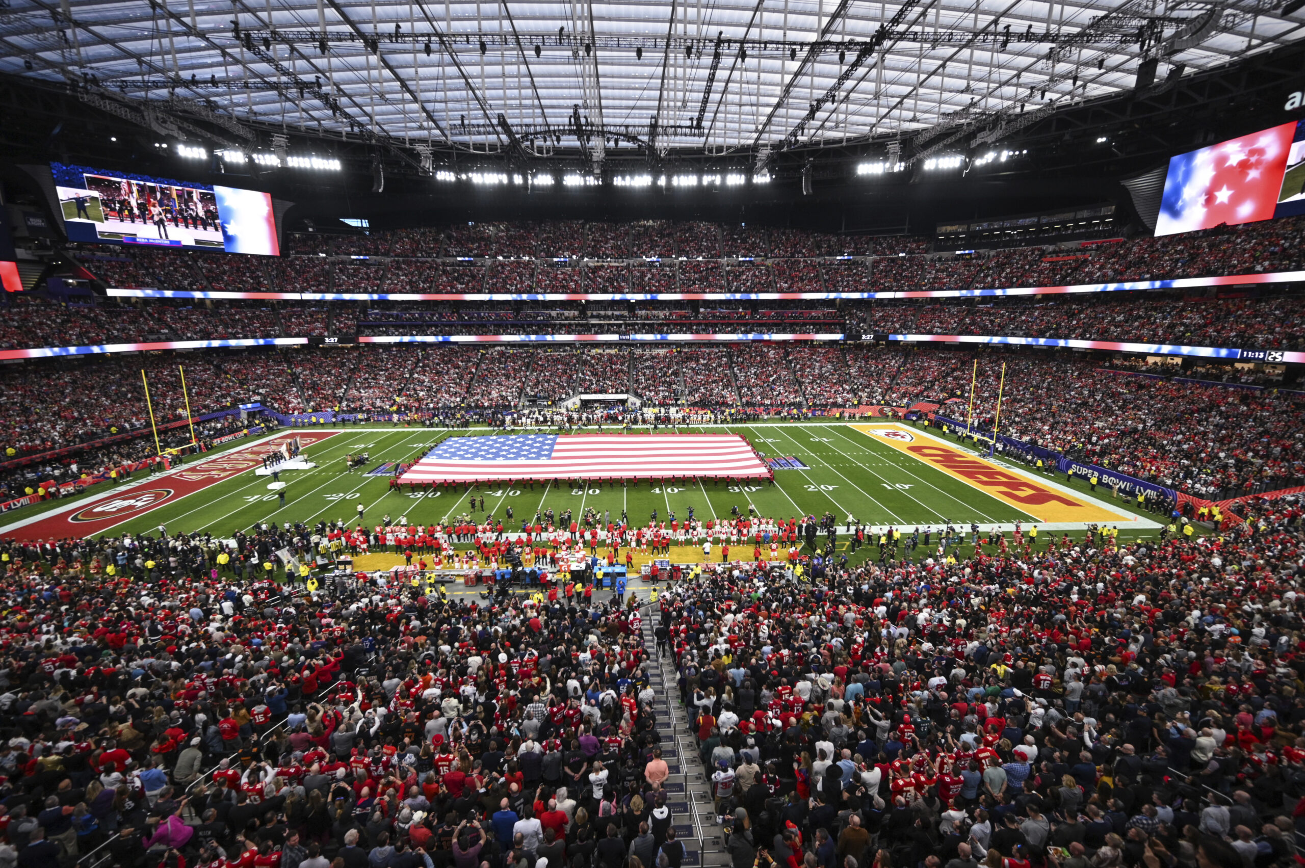 The large American flag on the field during the pre-game ceremony at Super Bowl LVIII was made by Colonial Flag in Sandy.