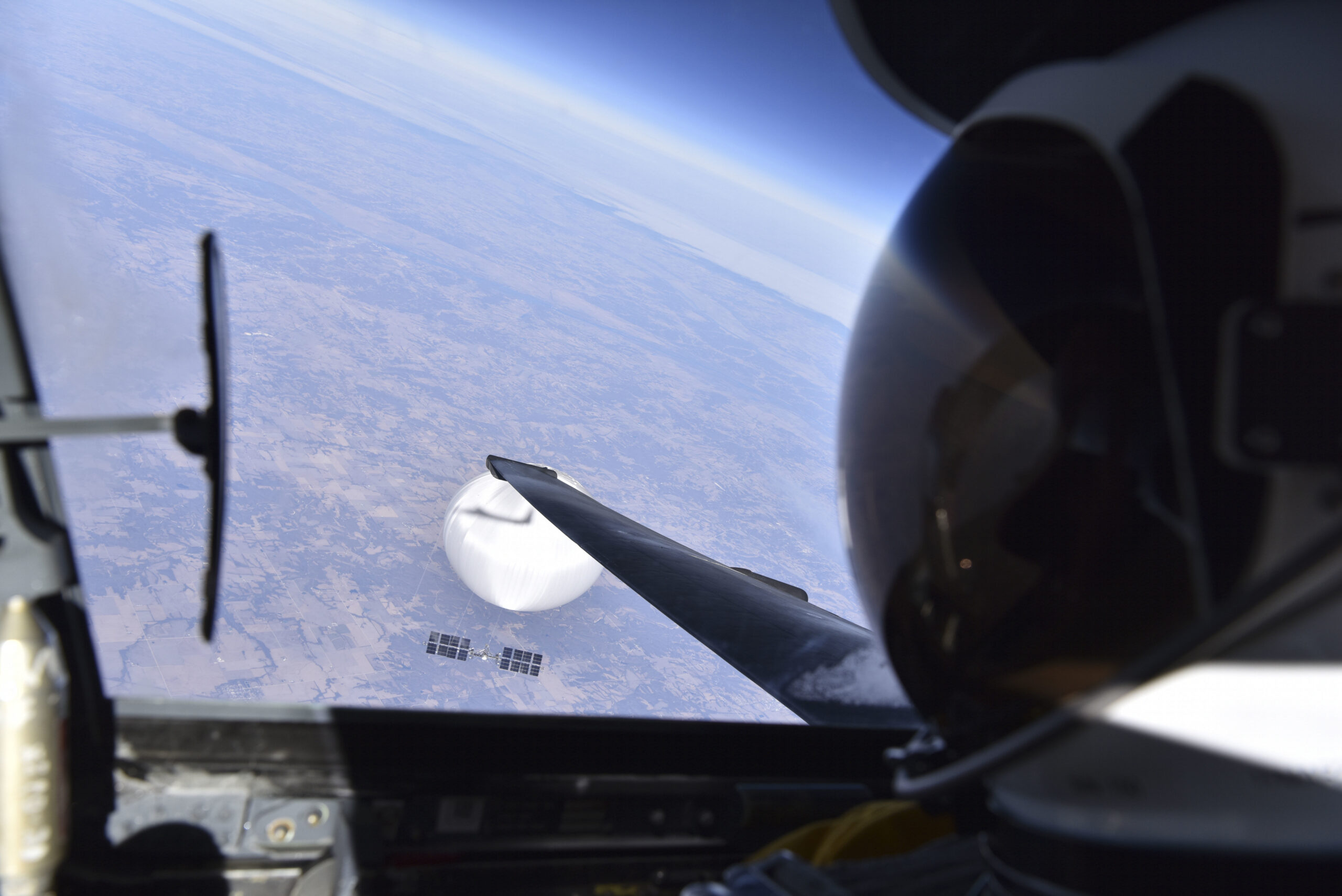 In this image provided by the Department of Defense, Wednesday, Feb. 22, 2023, a U.S. Air Force U-2 pilot looks down at a suspected Chinese surveillance balloon as it hovers over the United States on Feb. 3, 2023. A small and nonthreatening balloon spotted flying high over the mountainous Western United States was intercepted by fighter jets over Utah, Friday, Feb. 23, 2024, according to the North American Aerospace Defense Command.