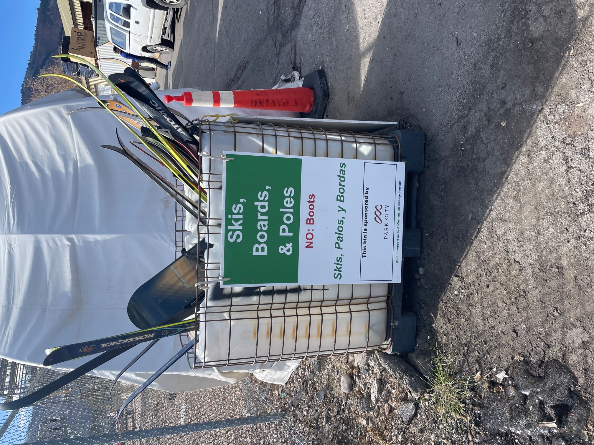 Bin of skis, boards and poles at Recycle Utah.