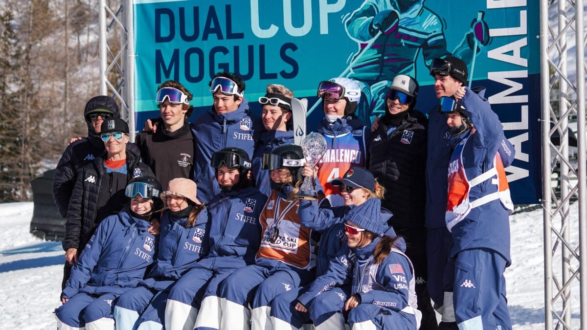 The Stifel U.S. Freestyle Ski Team moguls athletes smile on the podium after winning the Nations Cup.