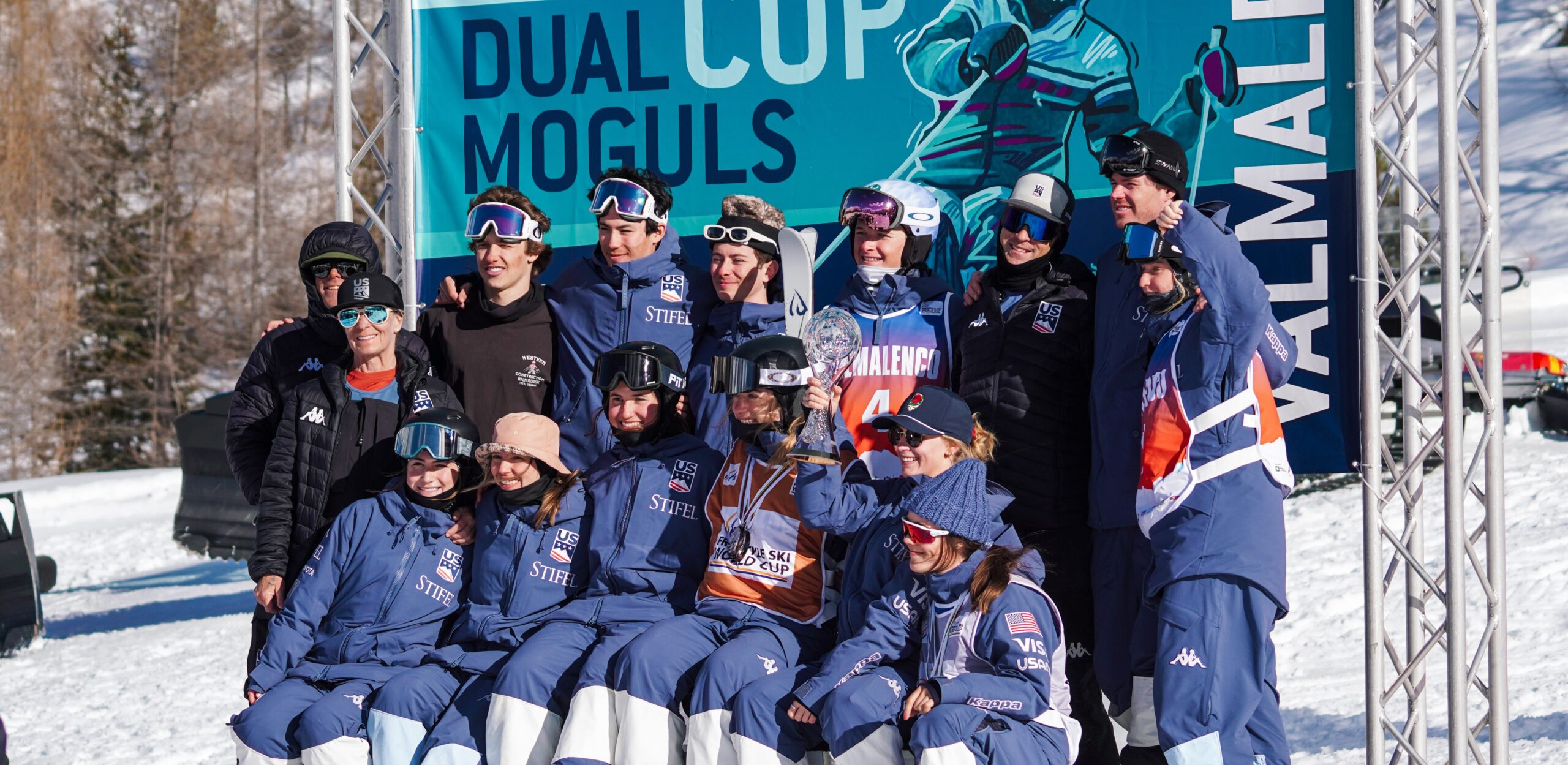 The Stifel U.S. Freestyle Ski Team moguls athletes smile on the podium after winning the Nations Cup.