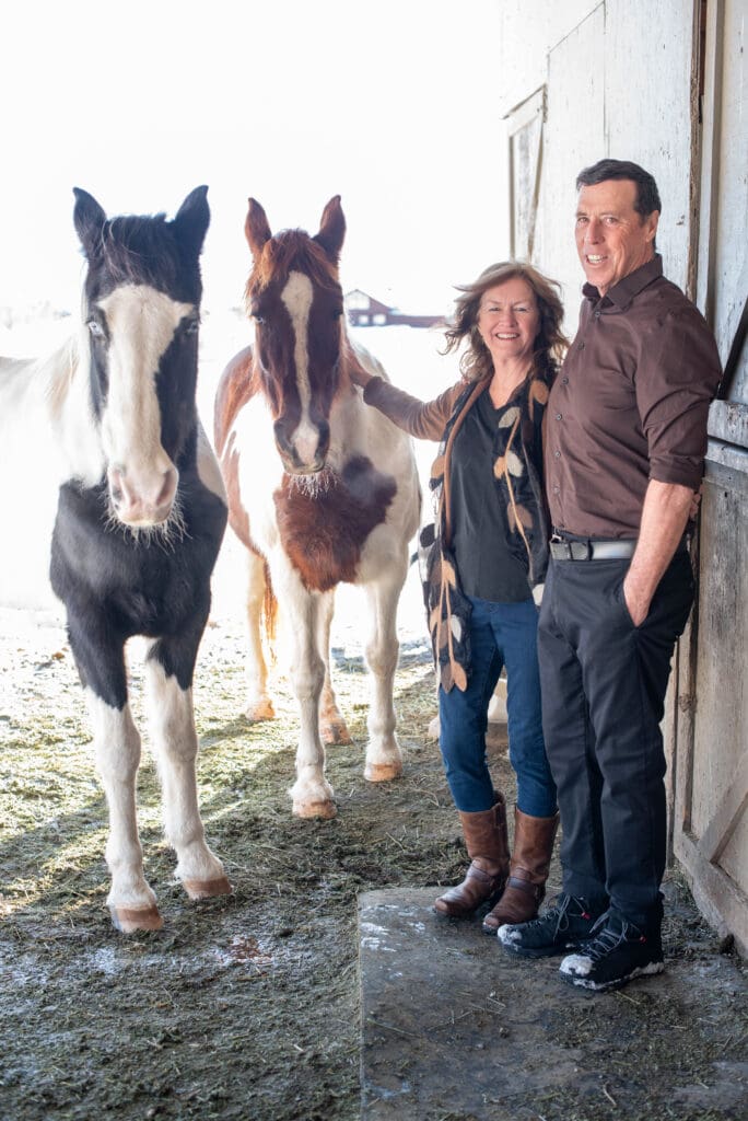 John and Maura with their horses. Photo: Dana Klein Creative // Dana Klein