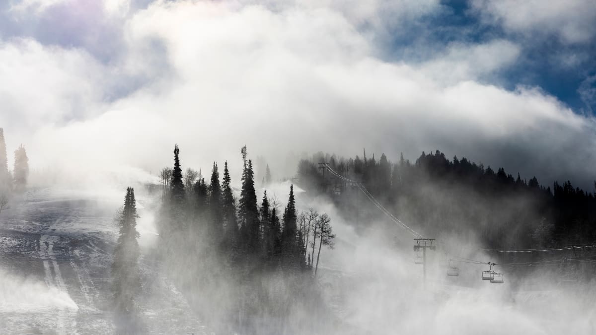 Snowy Deer Valley peeking through the clouds.