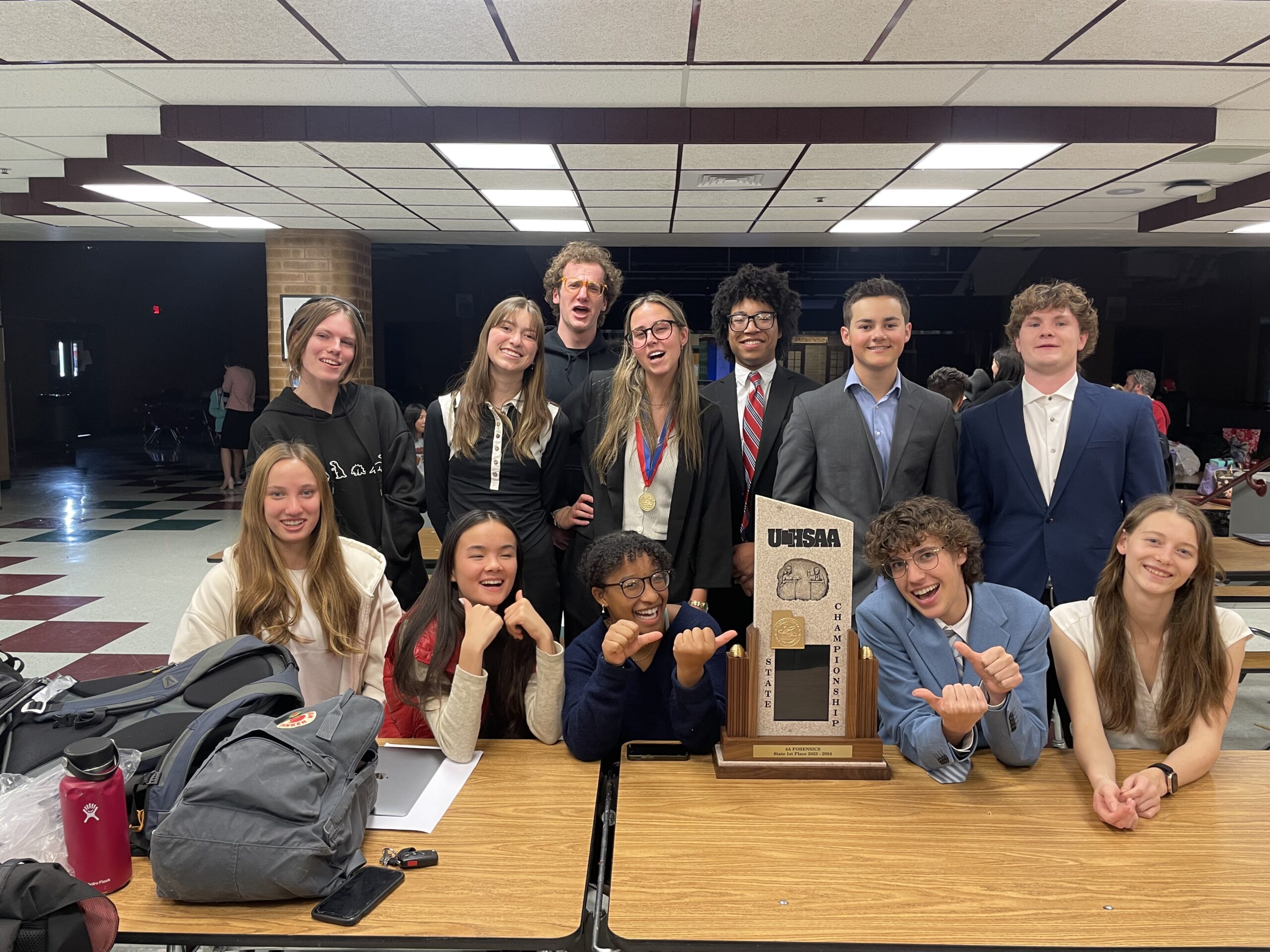 The PCHS Speech & Debate team celebrate their state championship win.