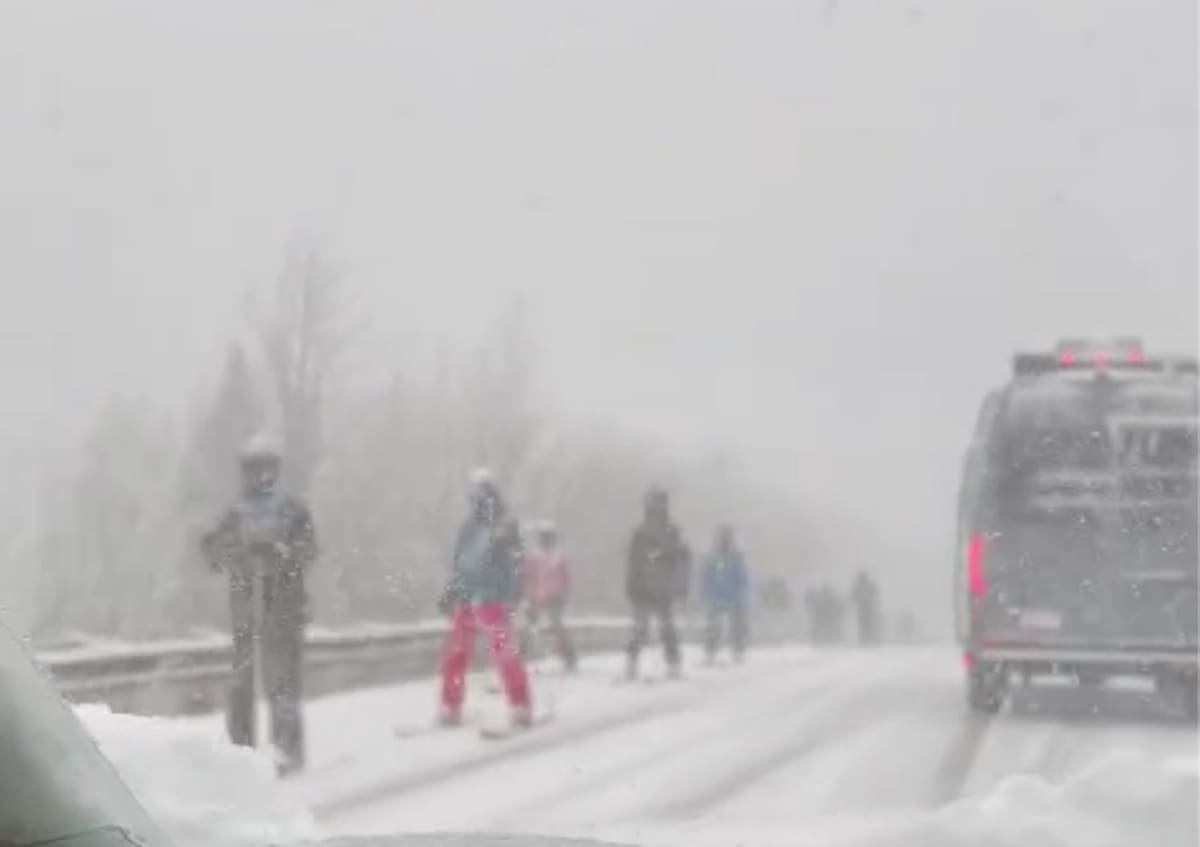 Stranded riders head down White Pine Canyon Road after Thundersnow storm closes lifts at Canyons Village