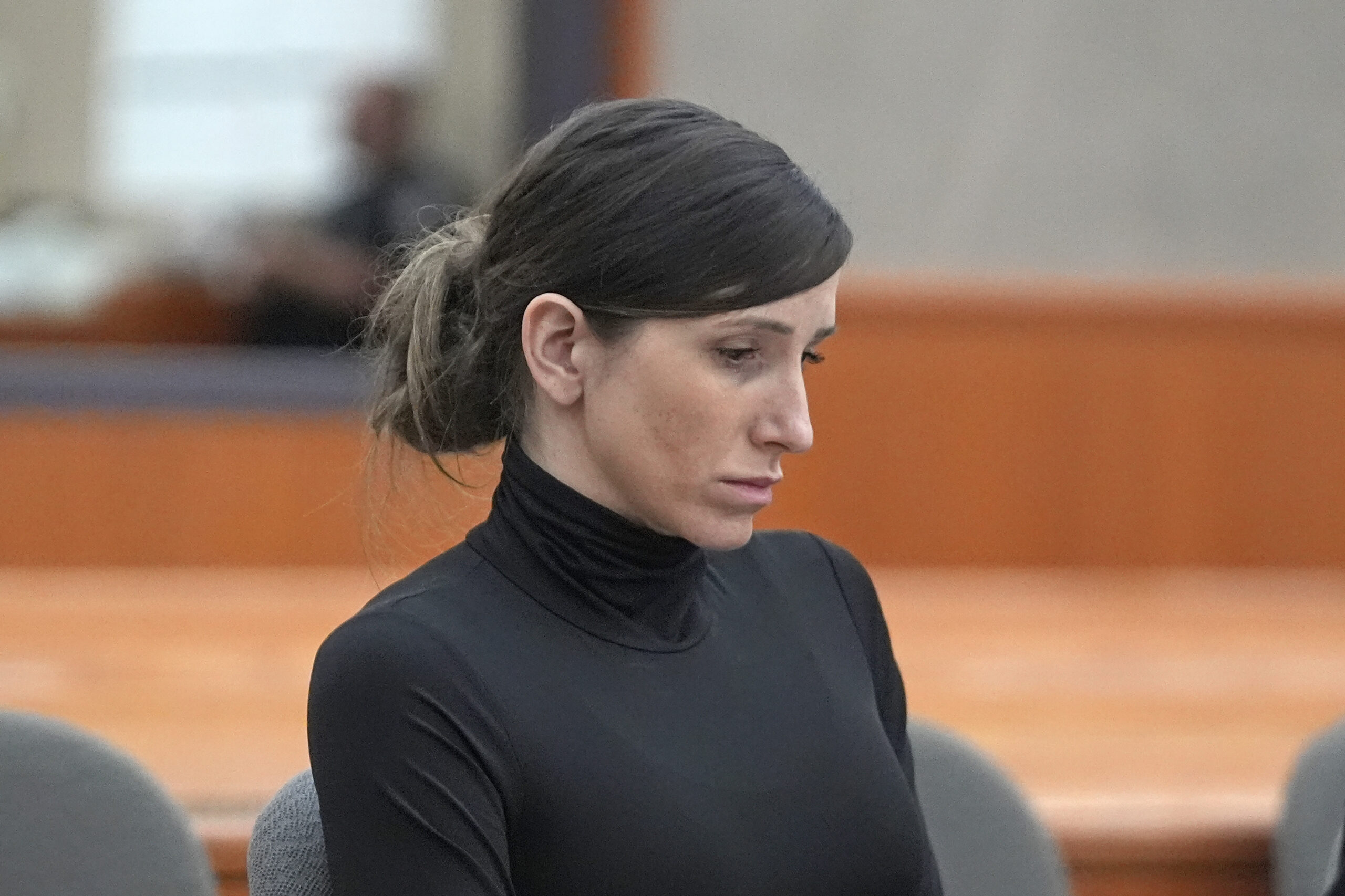 Kouri Richins, a Utah mother of three, who wrote a children's book about coping with grief after her husband's death and was later accused of fatally poisoning him, looks on during a hearing Wednesday, May 15, 2024, in Park City, Utah.