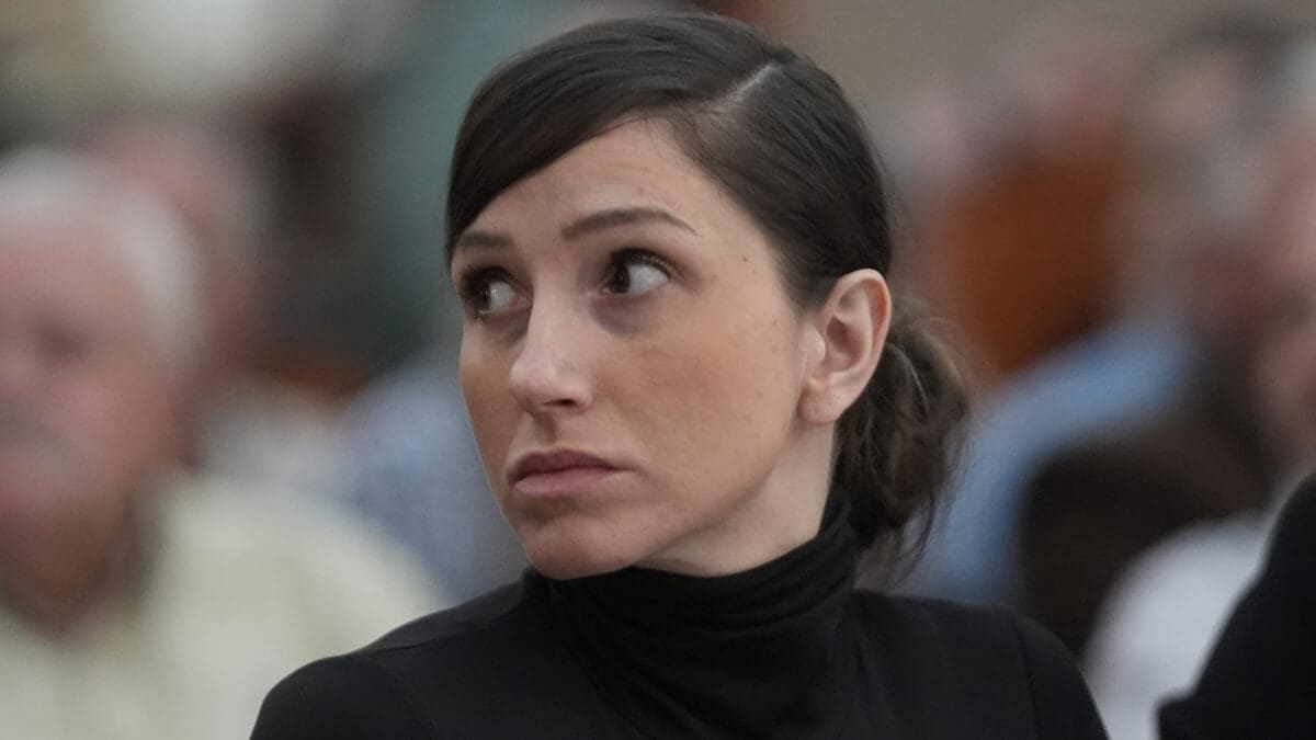Kouri Richins, a Utah mother of three, who wrote a children's book about coping with grief after her husband's death and was later accused of fatally poisoning him, looks on during a hearing Wednesday, May 15, 2024, in Park City, Utah.