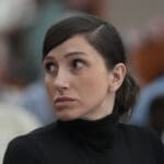 Kouri Richins, a Utah mother of three, who wrote a children's book about coping with grief after her husband's death and was later accused of fatally poisoning him, looks on during a hearing Wednesday, May 15, 2024, in Park City, Utah.