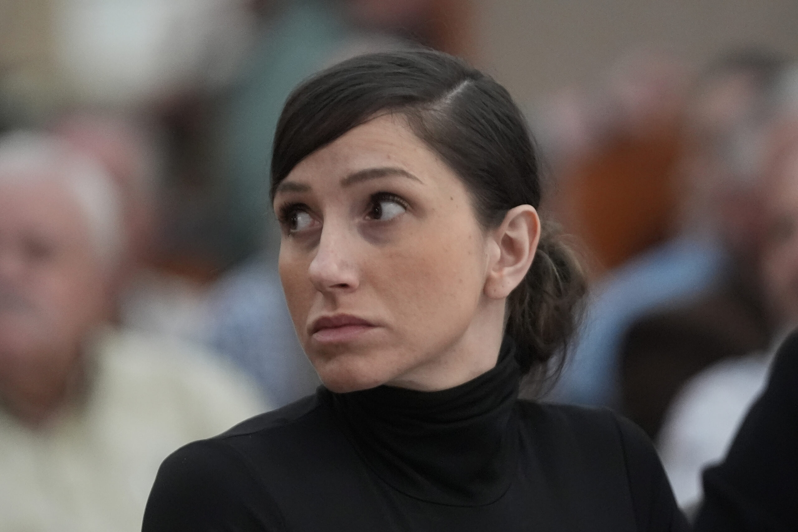 Kouri Richins, a Utah mother of three, who wrote a children's book about coping with grief after her husband's death and was later accused of fatally poisoning him, looks on during a hearing Wednesday, May 15, 2024, in Park City, Utah.