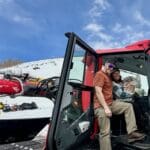 Torin Ray Benner-Campbell and his parents, Kayleigh & Stuart Benner, ready for their first snowcat ride as a family of three.