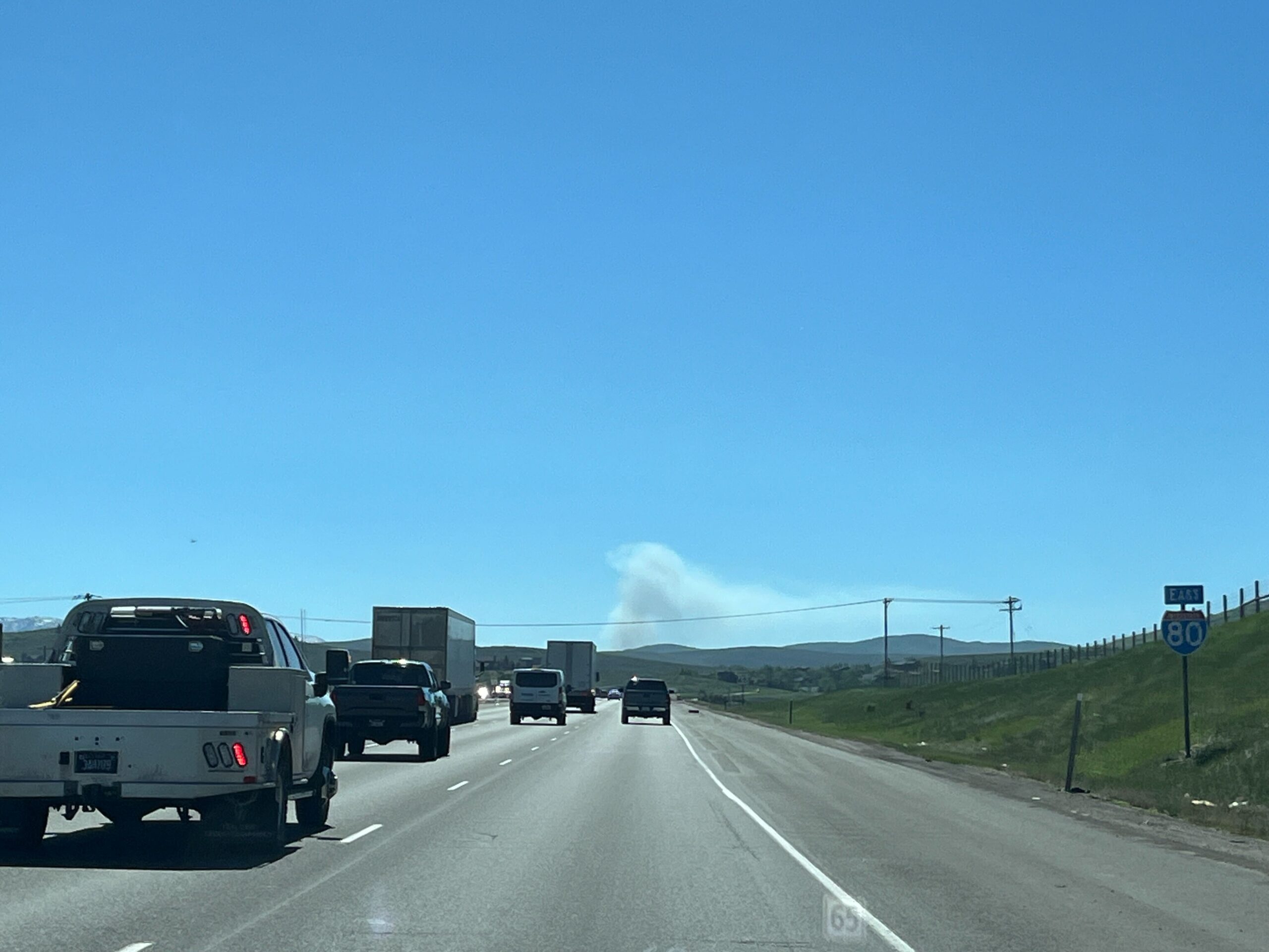 A smoke column from the prescribed burn along Mirror Lake Highway, east of Kamas. June 6, 2024.