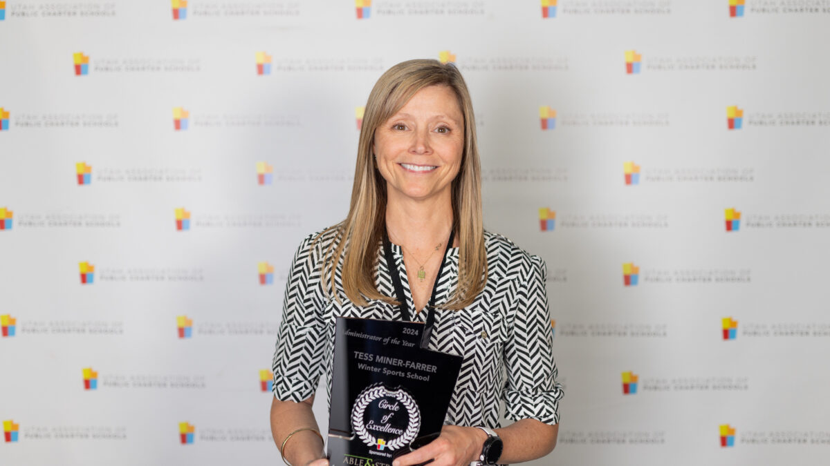 Tess Miner-Farra with her Circle of Excellence Award.