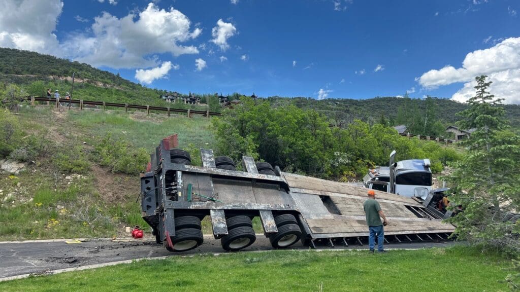 A freak semi accident left its driver transported after he was run over by his own truck.