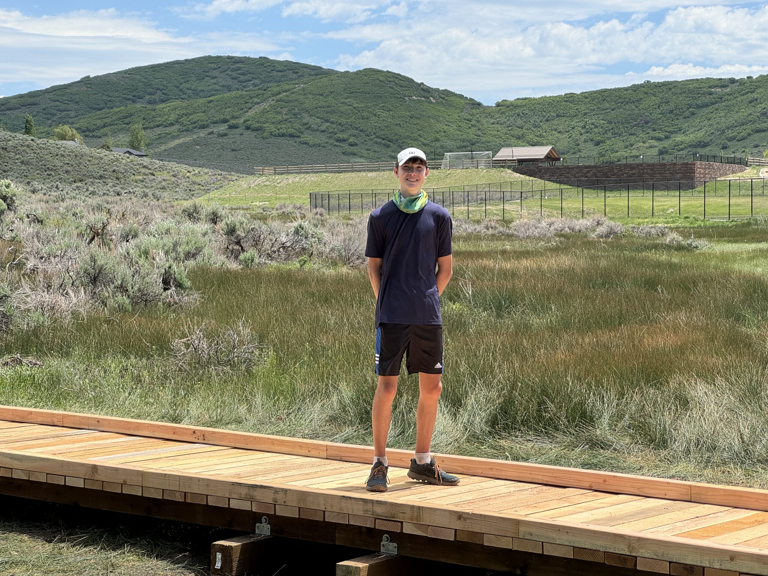 Henry Armentrout with the Puncheon Bridge he constructed with the help of Basin Recreation.