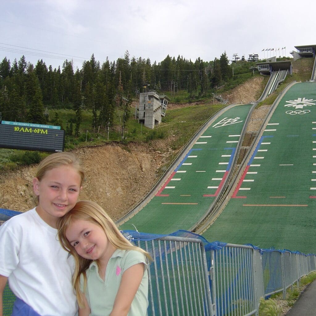 Anna and one of her siblings as youngsters at the Utah Olympic Park.