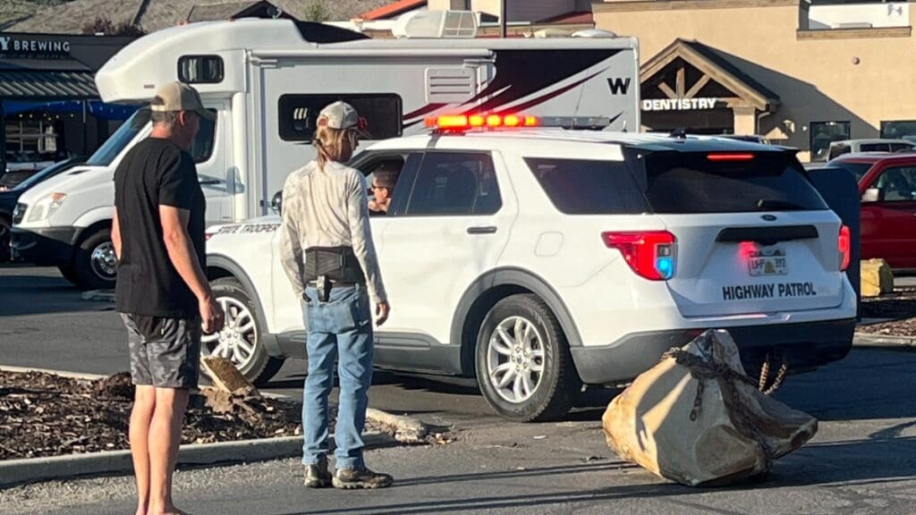 Utah Highway Patrol towed the rogue boulder to a safe zone in the Kimball Junction parking lot. July 9, 2024.