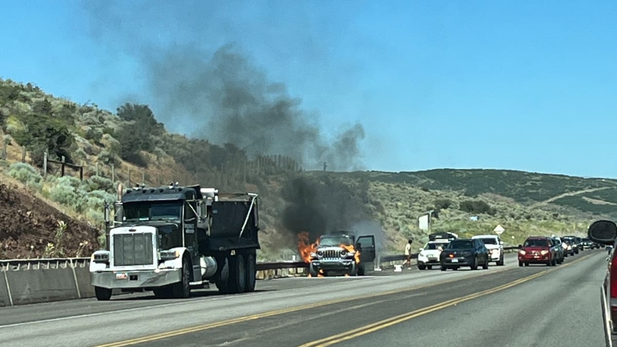 A Jeep catches fire on Highway 248 / Kearns Blvd. on Monday ,July 8 at around 4:15 p.m.