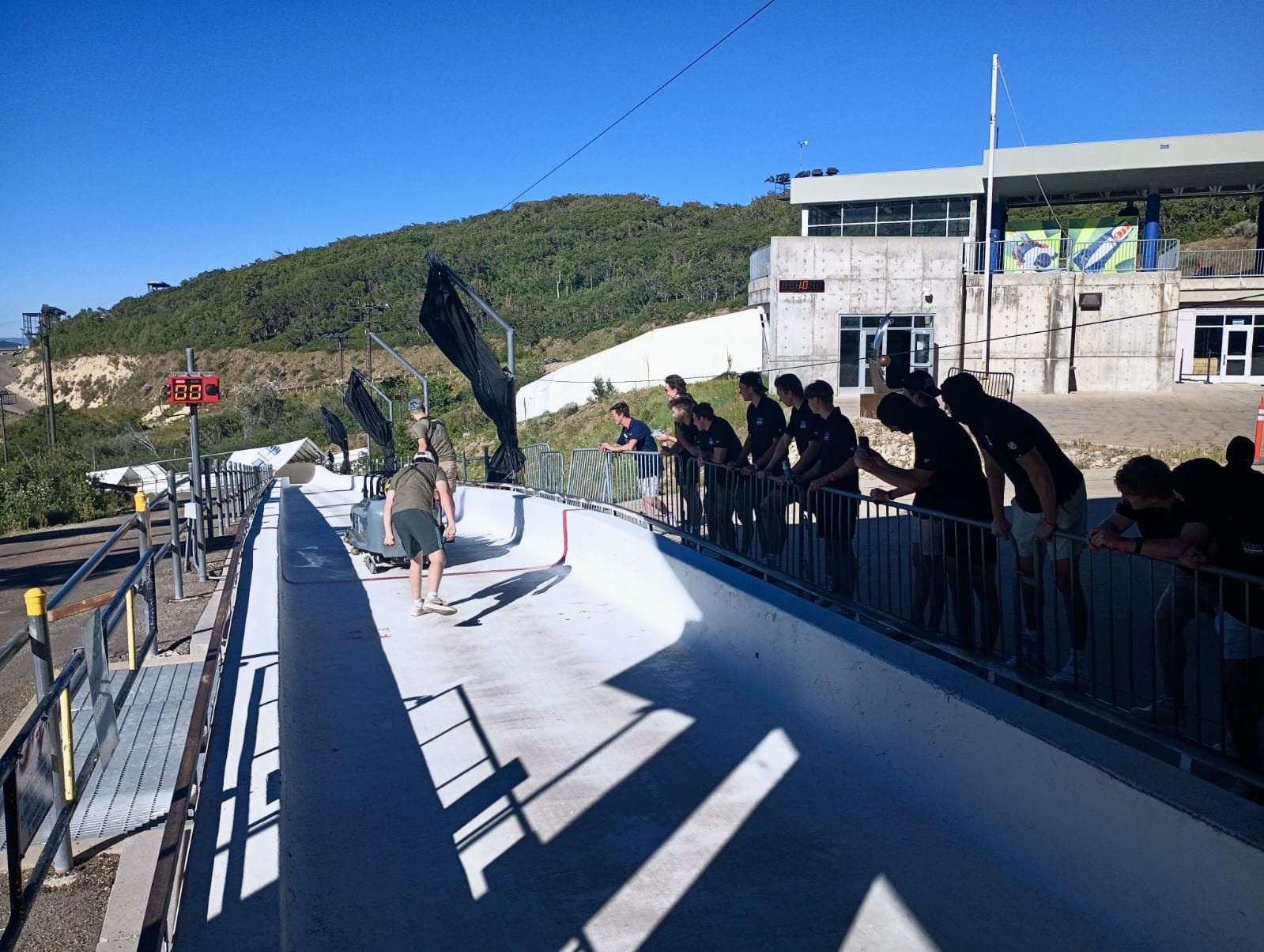 Some members of the Utah Hockey Club enjoying bobsled rides at the UOP.