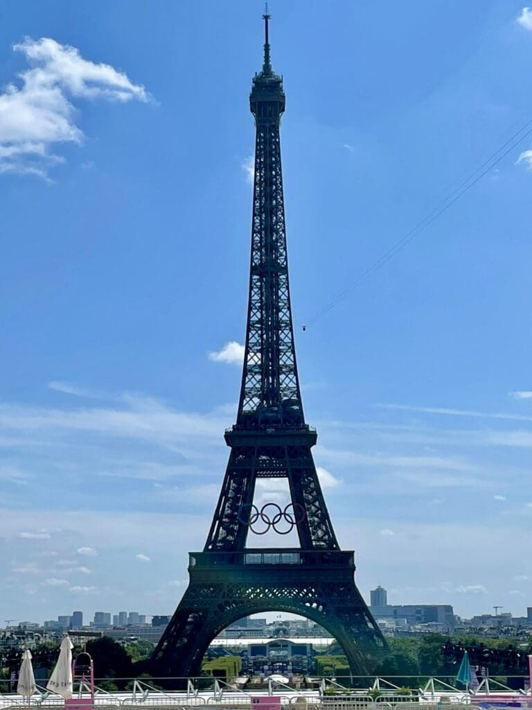 The Beijing Victory Ceremony was held in the shadow of the Eiffel Tower adorned with Olympic Rings In Paris at the 2024 Olympics.