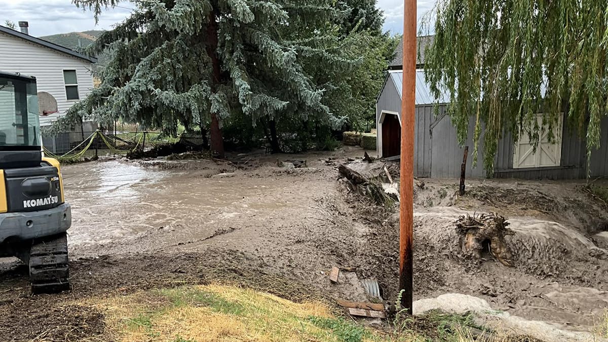 A flash flood rips through a property along Chalk Creek road Sunday, August 18, 2024.